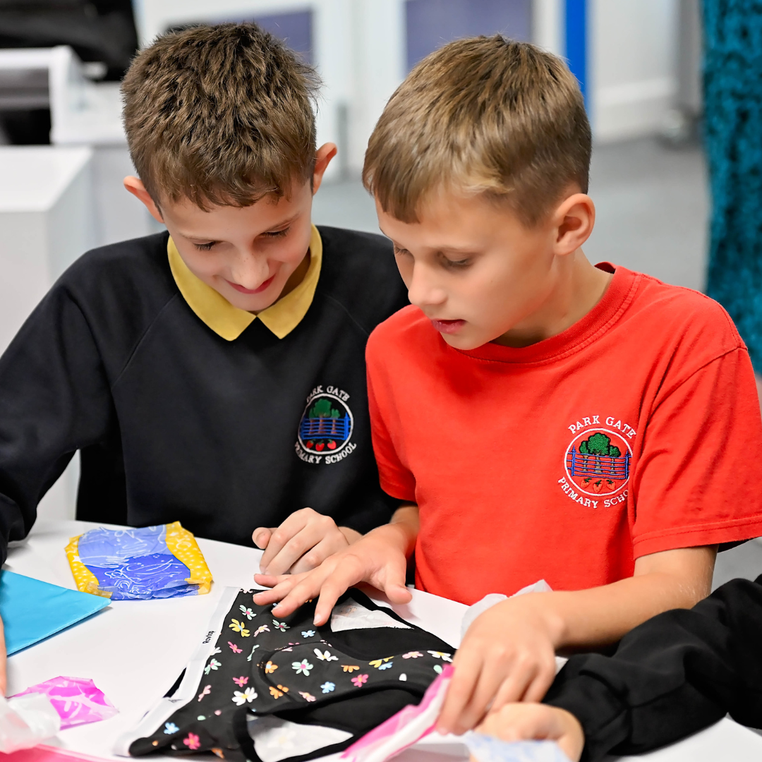 Pupils looking at menstural pads on underwear